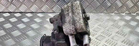 Volkswagen Caddy Oil filter mounting bracket 06A115417
