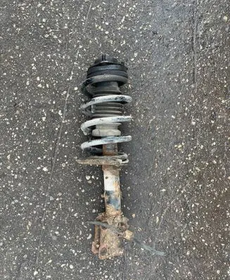 Volkswagen Touran I Front shock absorber with coil spring