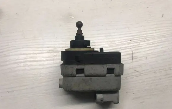 Mazda 323 Headlight level adjustment motor 
