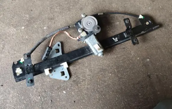 Rear door window regulator with motor