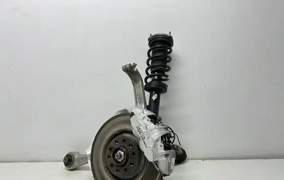 Front wheel hub spindle knuckle