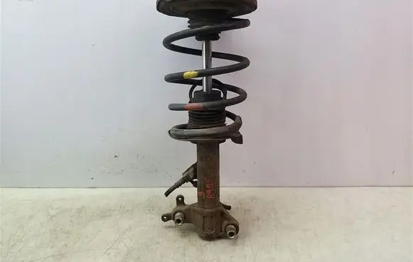 Nissan Primera Front shock absorber with coil spring 