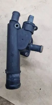 Thermostat/thermostat housing