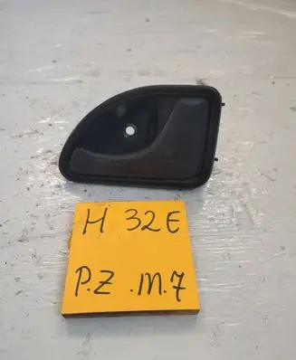 Renault Kangoo I Front door interior handle 7700329524