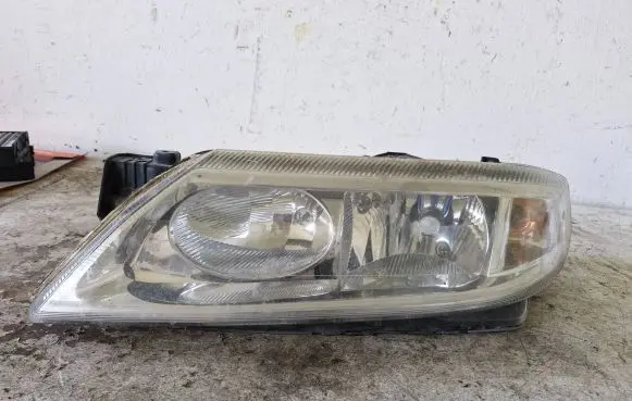 Renault Laguna II Headlight/headlamp 89004275 89003523