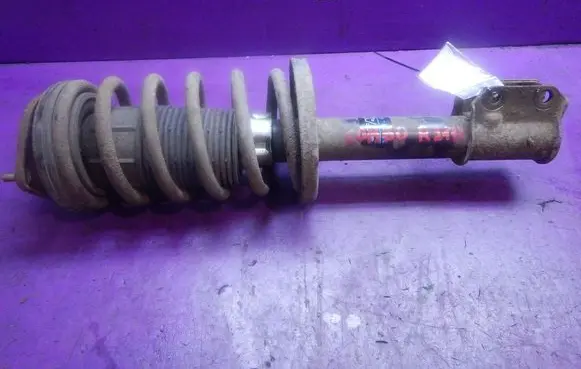 Opel Combo B Front shock absorber with coil spring 