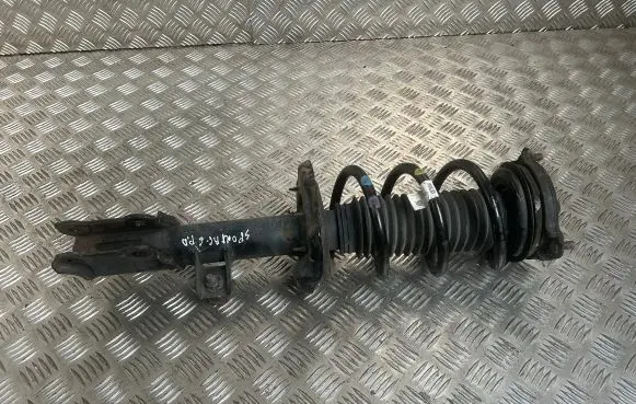 Front shock absorber with coil spring