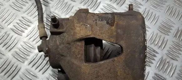 Volkswagen Golf IV Front brake caliper
