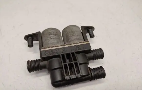 Coolant heater control valve