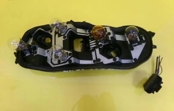 Opel Corsa D Tail light bulb cover holder 89037853