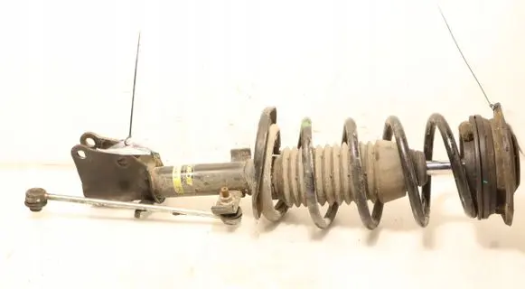 Front shock absorber with coil spring