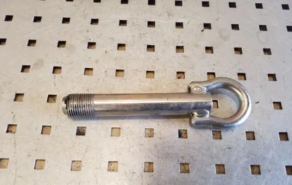 Towing hook eye
