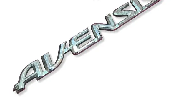 Toyota Avensis T270 Front door emblem/model letters MIXX343