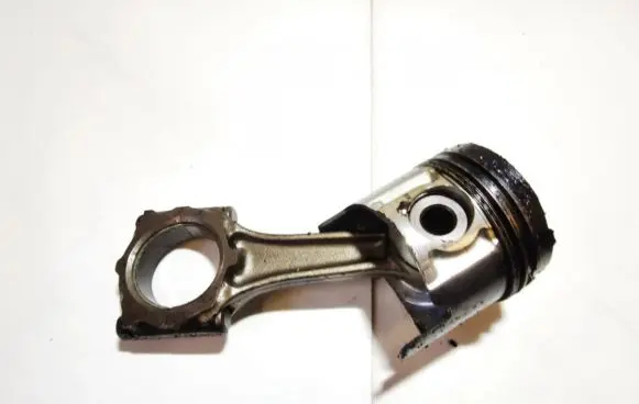 Opel Astra G Piston with connecting rod