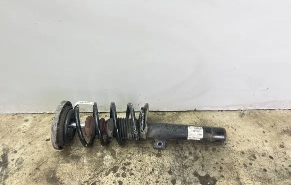 Front shock absorber with coil spring