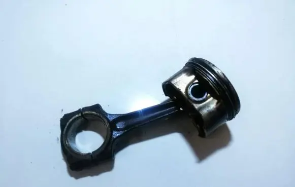 Piston with connecting rod