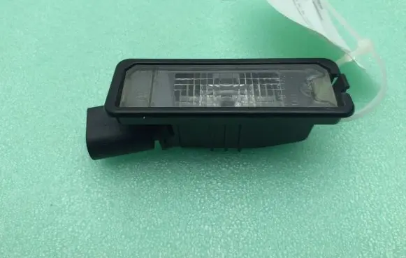 Volkswagen Golf VII Number plate light 1K8943021