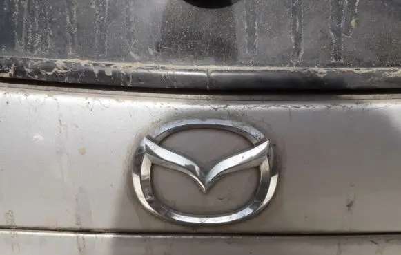 Mazda 323 F Manufacturer badge logo/emblem 