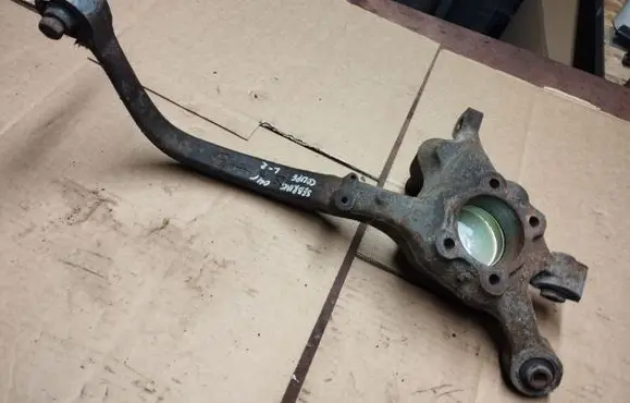 Rear wheel hub spindle/knuckle