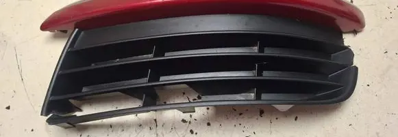 Volkswagen Jetta V Front bumper lower grill 1K0853665G