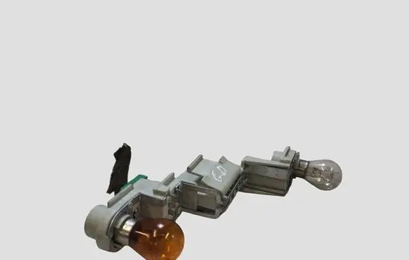 Volvo V50 Tail light bulb cover holder