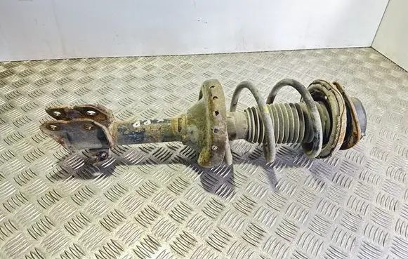 Subaru Outback Front shock absorber with coil spring 20310AJ090