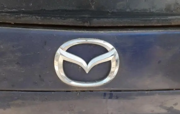 Mazda 323 F Manufacturer badge logo/emblem 