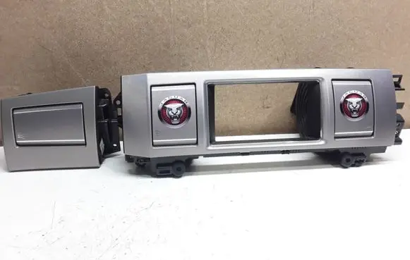 Jaguar XF Dash center air vent grill 8X2319K617 8X23014A23