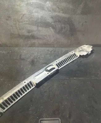 Engine bonnet/hood lock trim molding