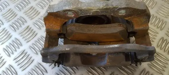 Peugeot 208 Front brake caliper 9805497780
