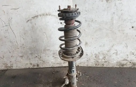 Honda Civic Front shock absorber with coil spring 51601