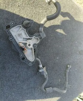 Volkswagen Golf SportWagen Oil breather separator 06K103495AG