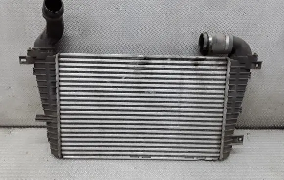 Opel Zafira B Intercooler radiator 13223395