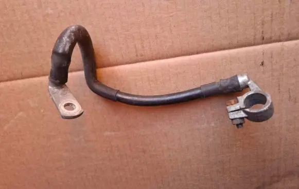 Volkswagen Touran I Negative earth cable (battery) H325