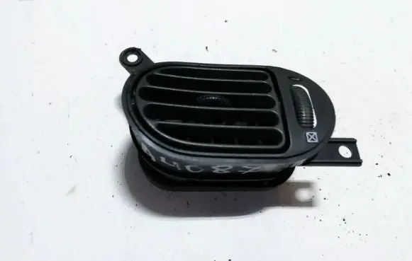Mazda 121 Dash center air vent grill