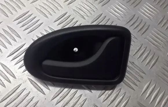 Dacia Logan I Rear door interior handle trim 7700830079