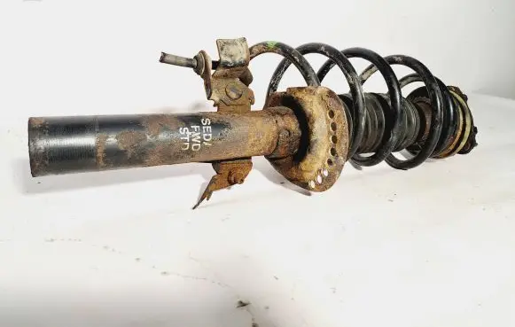 Front shock absorber with coil spring