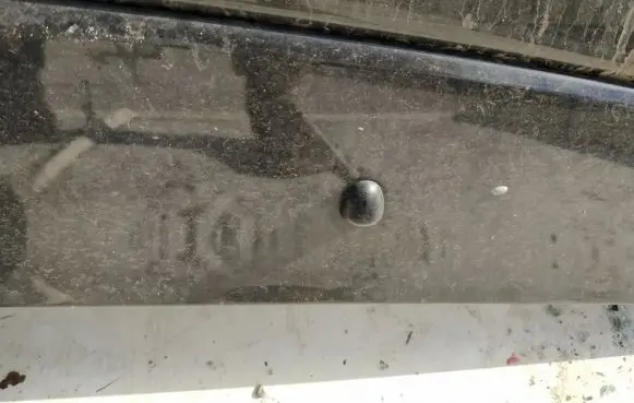 Windshield washer spray nozzle