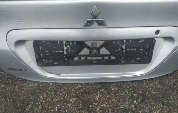 Mitsubishi Lancer X Trunk door license plate light bar 