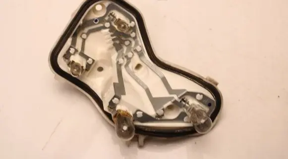 Opel Astra J Tail light bulb cover holder 13306460