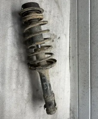 Volkswagen PASSAT B7 USA Front shock absorber/damper 634811