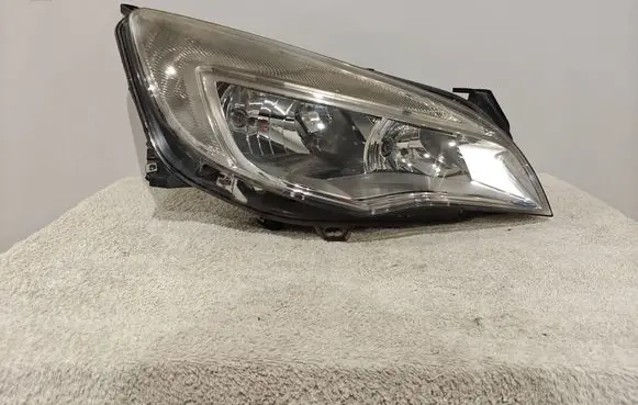 Opel Astra J Headlight/headlamp 1EG010011