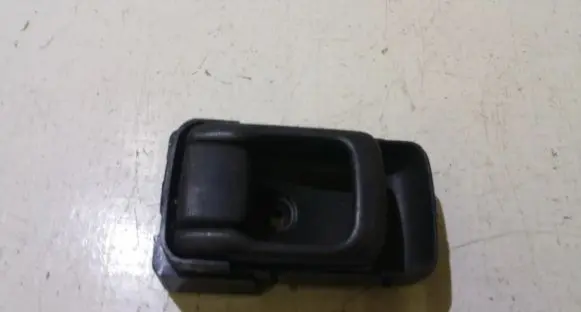 Mazda 323 Front door interior handle