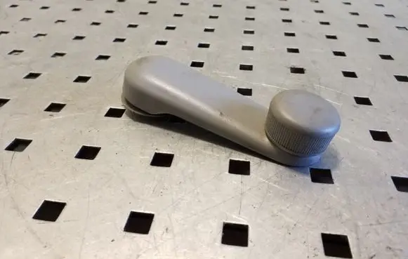 Mazda Premacy Rear door window winding handle 