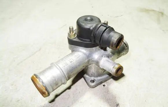 Thermostat/thermostat housing