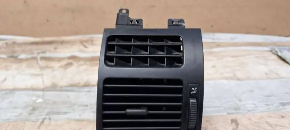 Volkswagen Touran I Dashboard side air vent grill/cover trim 1T0819703B