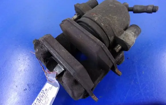 Volkswagen Golf IV Front brake caliper