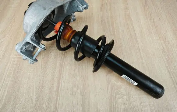 Audi A5 Front shock absorber with coil spring 8K0413031BE