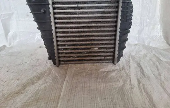Volkswagen Golf IV Intercooler radiator 1J0145803