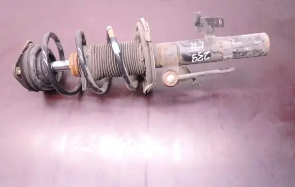 Volvo V40 Front shock absorber with coil spring D239